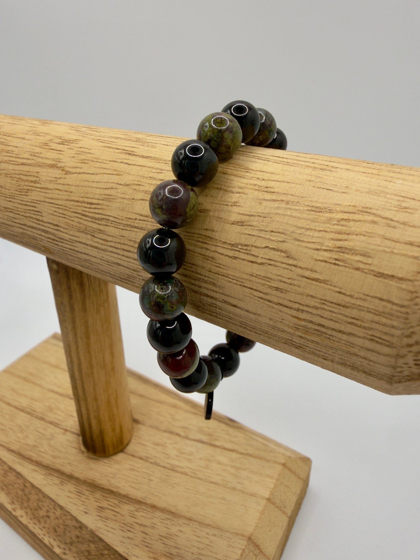 Black Tourmaline and Bloodstone protection bracelet with silver angel charm on stretch fit band