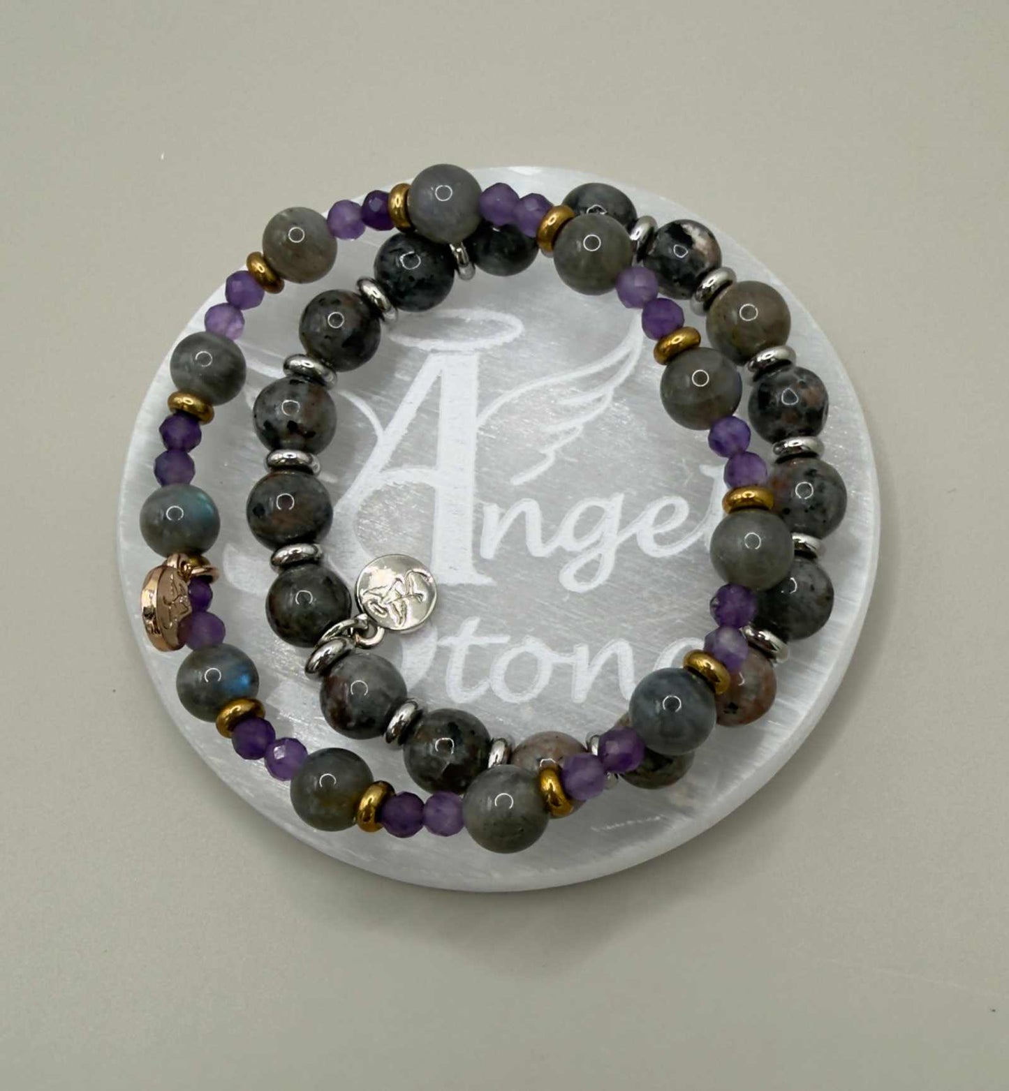Angel Stones selenite charging plate with engraved wings and halo design for crystal cleansing and recharging