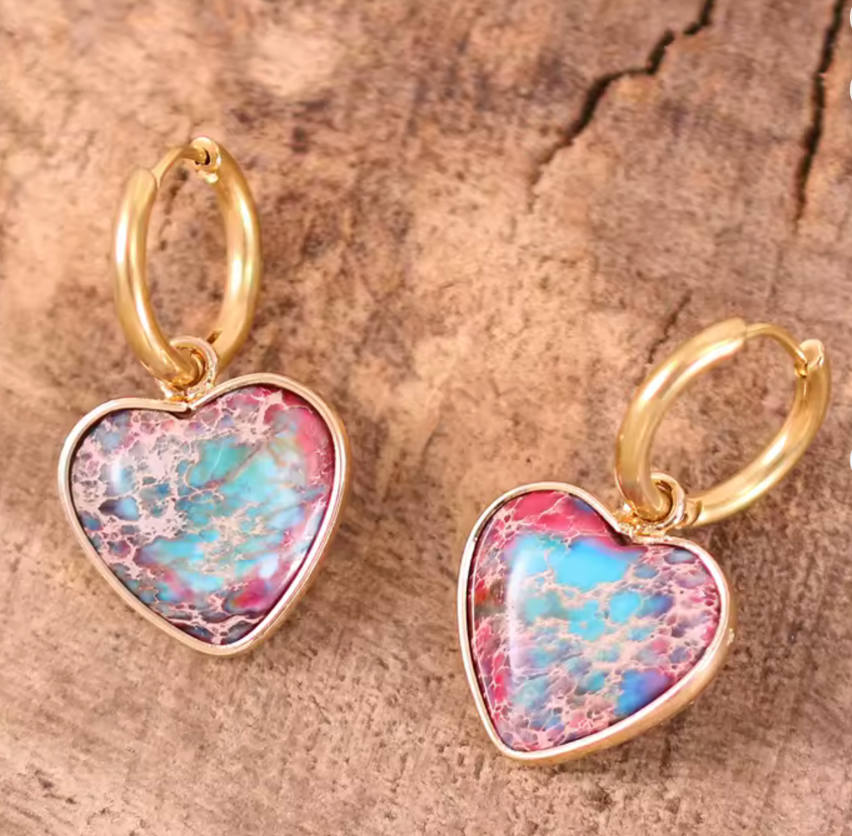 Heartfire Jasper Huggie Earrings with heart-shaped pink and blue jasper stones on gold-tone hoops