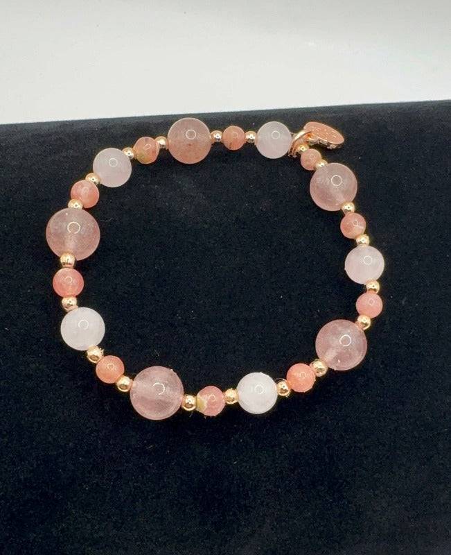Love Harmony Bracelet featuring strawberry quartz, rose quartz, rhodochrosite beads, and rose gold accents