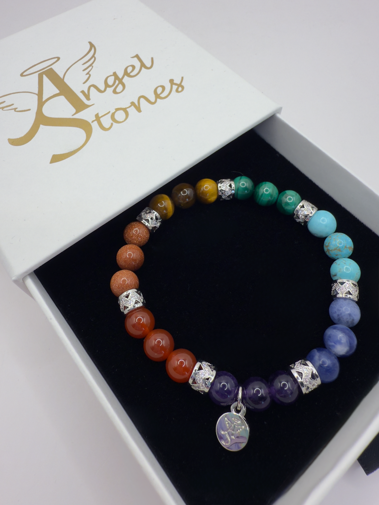 Colorful Chakra Bracelet with Dragon Fire Agate, Goldstone, Yellow Tiger Eye, Malachite, Turquoise, Sodalite, and Amethyst beads in Angel Stones box