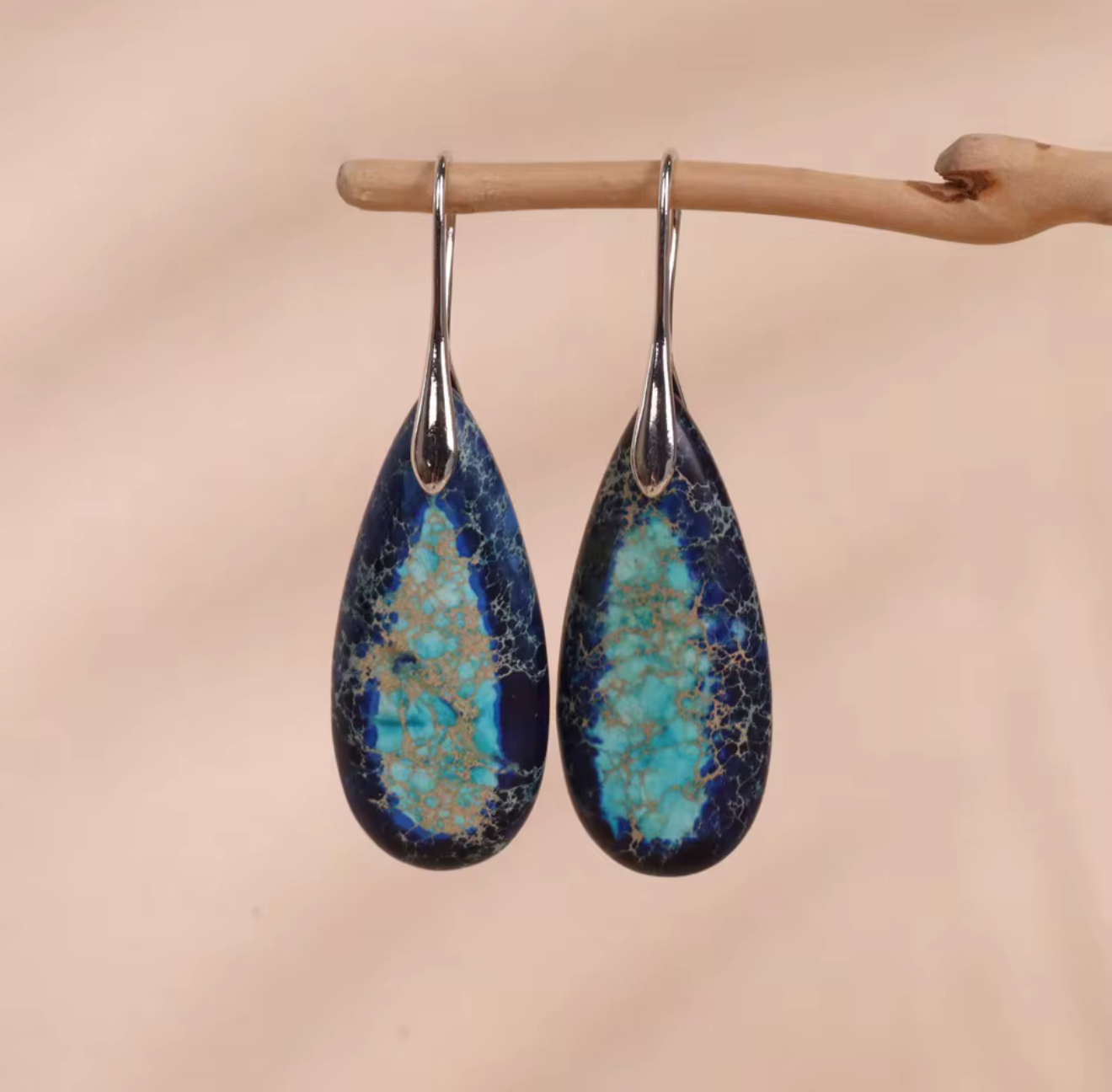 Deep Current Jasper Drop Earrings with elongated teardrop jasper stones in navy, turquoise, and ocean blue tones with gold or silver hangers