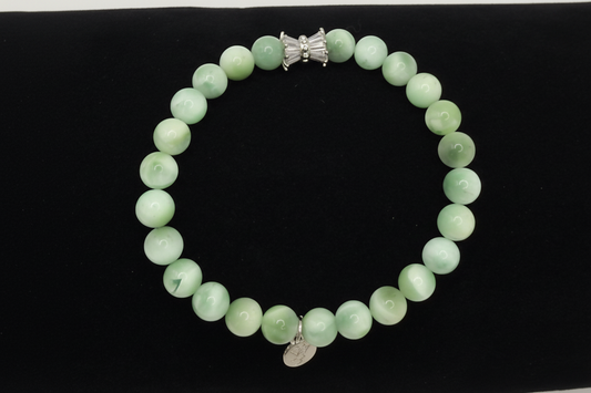 Seafoam Serenity Green Larimar Bracelet with smooth polished beads and elegant charm in soft green ocean tones