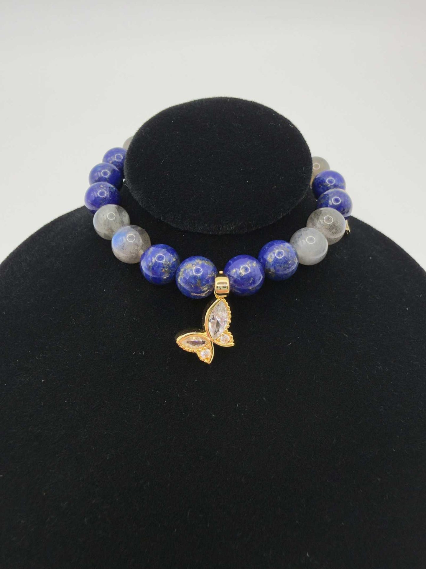 Lapis Lazuli and Labradorite Transformation Bracelet with butterfly charm and gold accents on stretch cord