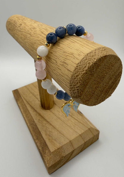Blue kyanite, moonstone, and rose quartz grief bracelet with optional angel wings charm, handmade for emotional support and healing
