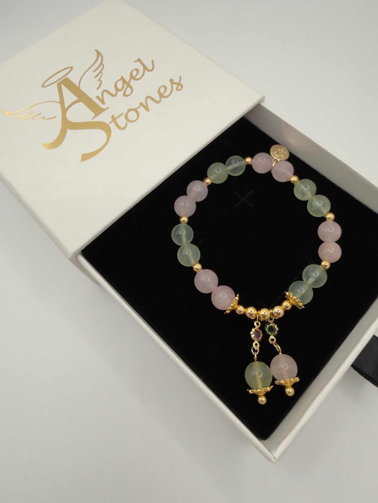 Love in Bloom bracelet with rose quartz and prehnite beads in soft pink and green hues