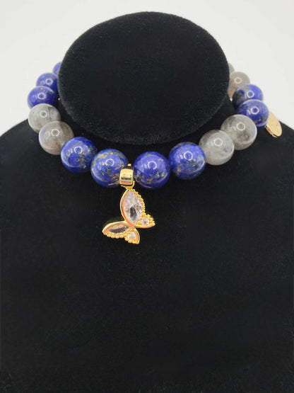 Lapis Lazuli and Labradorite bracelet with gold butterfly charm, deep blue and iridescent beads on stretch cord