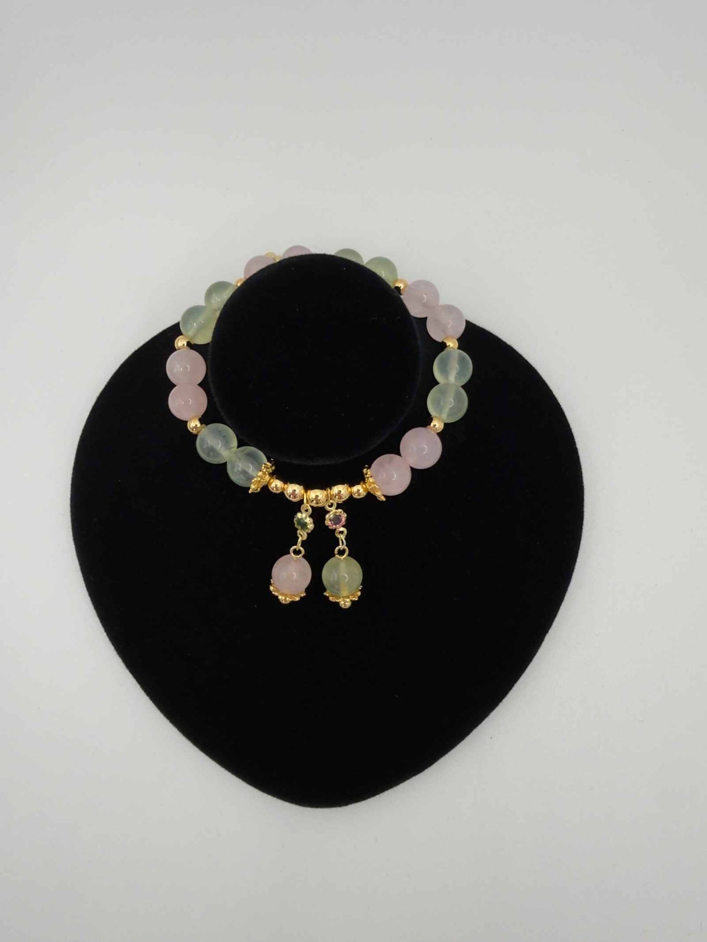 Love in Bloom bracelet with rose quartz and prehnite beads in soft pink and green tones