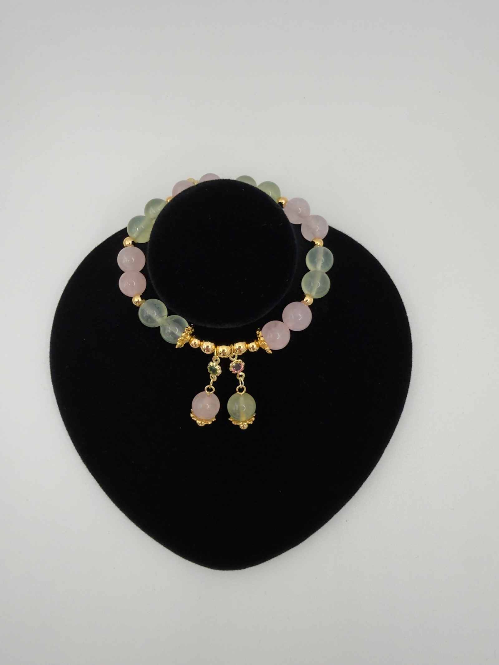 Love in Bloom bracelet with rose quartz and prehnite beads in soft pink and green tones
