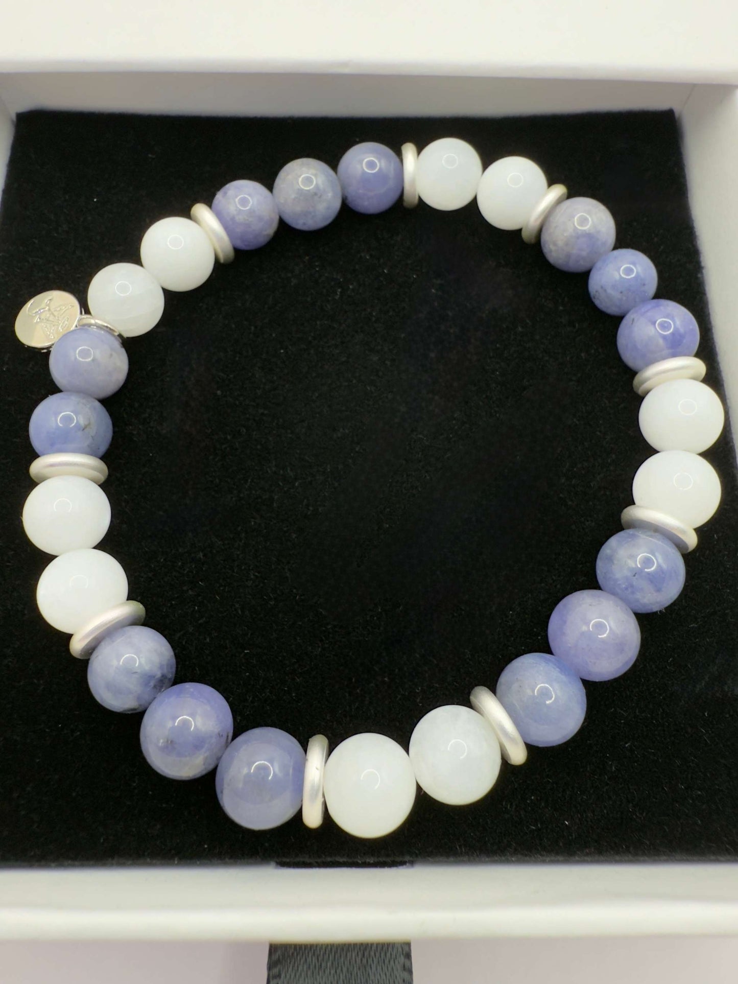 Moonlight Metamorphosis Bracelet featuring Tanzanite and Moonstone beads for emotional healing and transformation