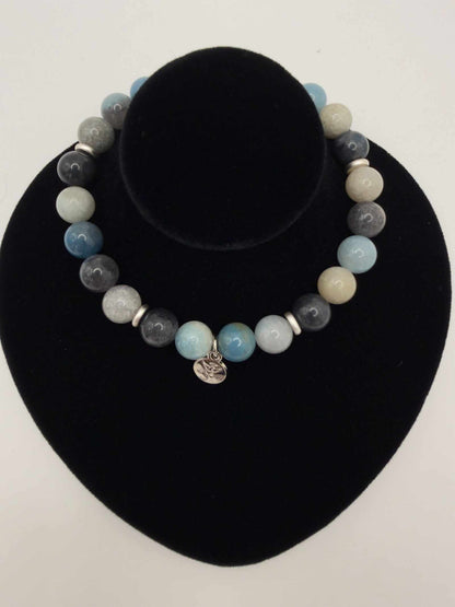 Tranquil Awakening Trolleite Bracelet with soft blue polished beads and elegant accent bead for calming, everyday wear