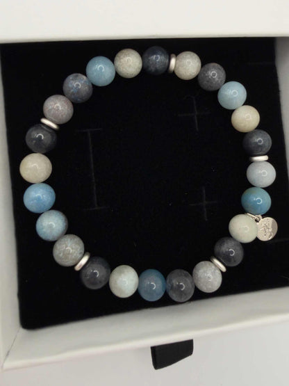 Tranquil Awakening Trolleite Bracelet with soft blue beads and elegant accent bead, polished and handcrafted for calming everyday wear