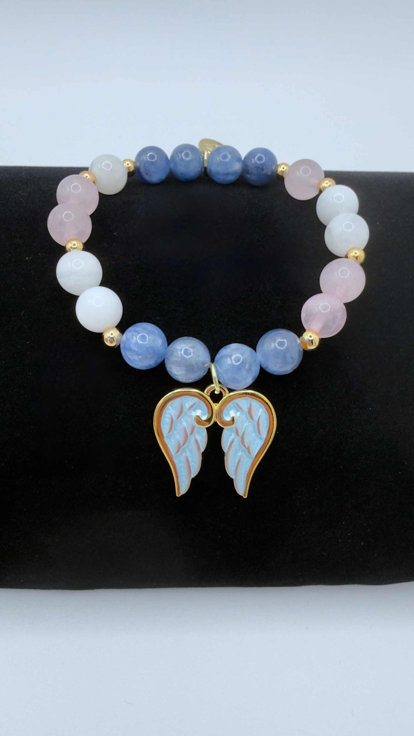 Blue Kyanite, Moonstone, and Rose Quartz grief bracelet with optional angel wings charm on stretch cord
