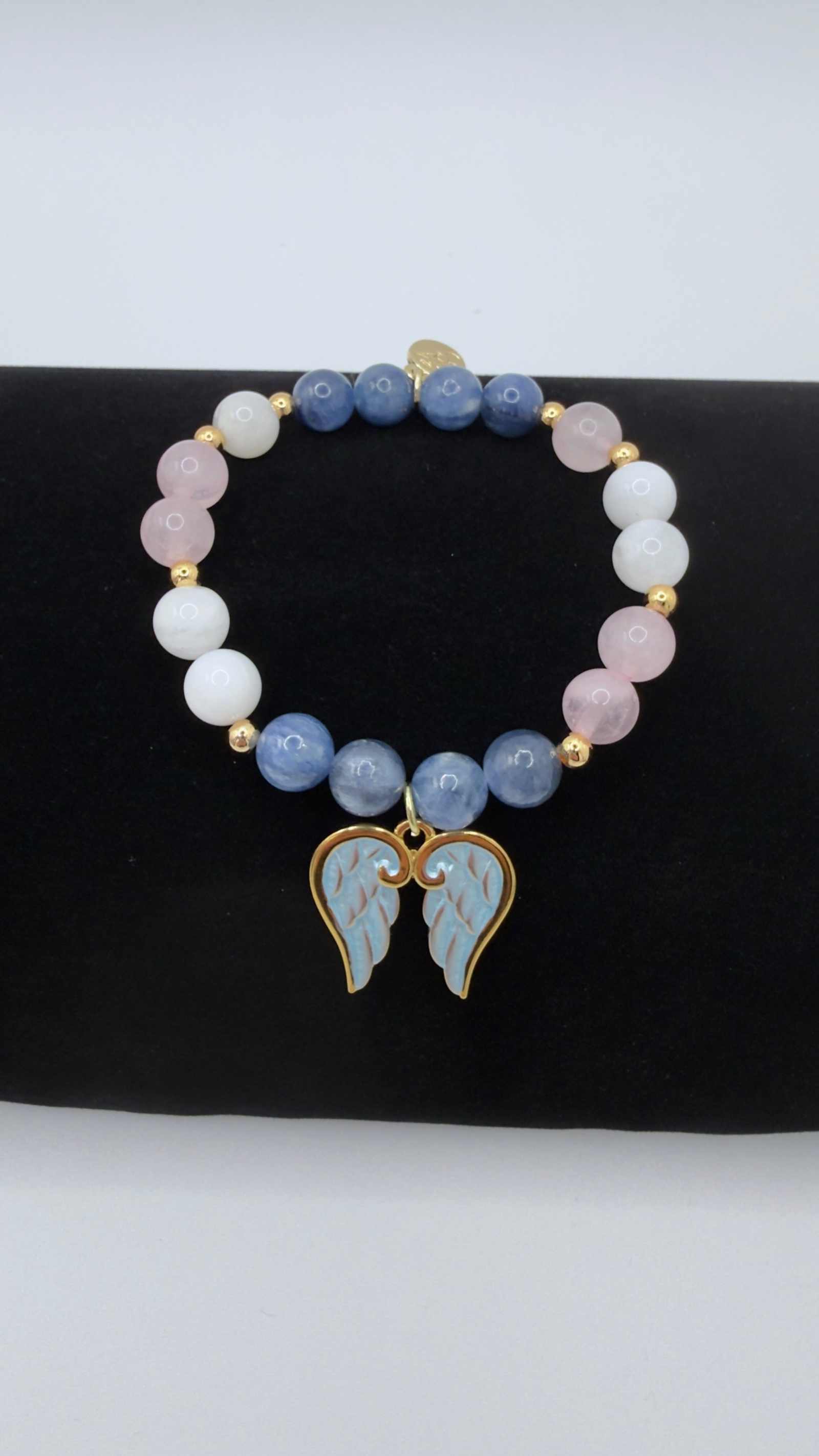 Blue Kyanite, Moonstone, and Rose Quartz grief bracelet with optional angel wings charm on stretch cord