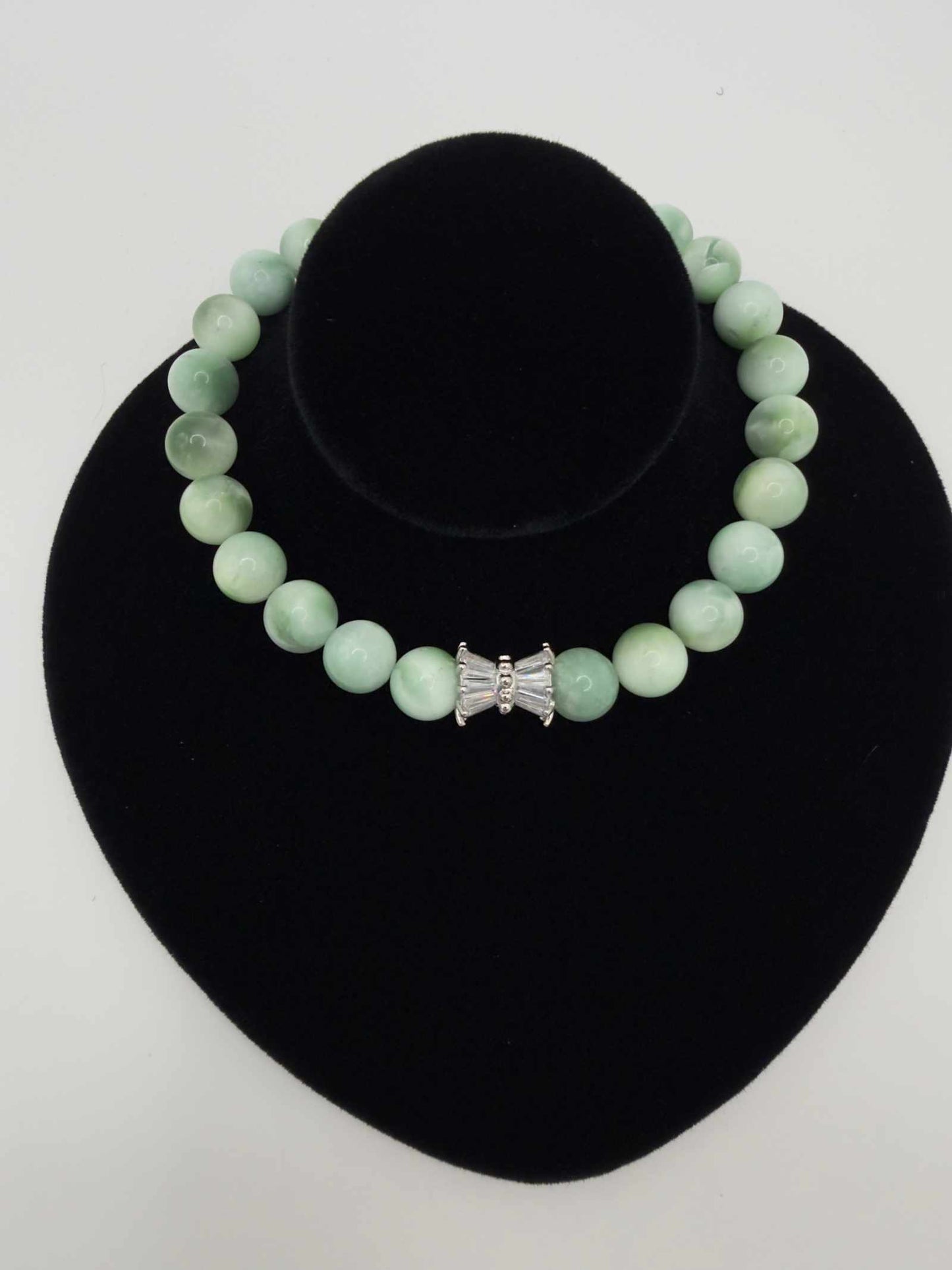 Seafoam Serenity Green Larimar Bracelet with polished green larimar beads and elegant charm