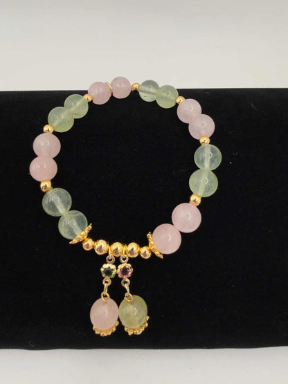 Love in Bloom Bracelet with rose quartz and prehnite beads in soft pink and green tones