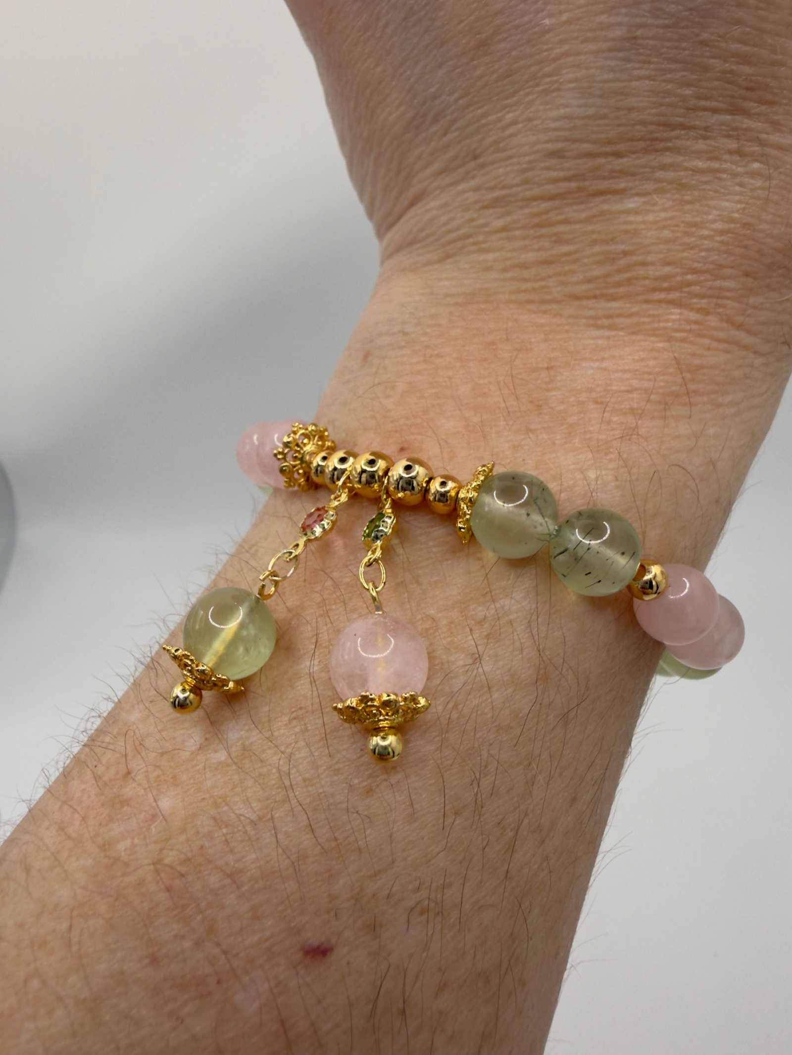 Love in Bloom bracelet with rose quartz and prehnite beads in soft pink and green tones