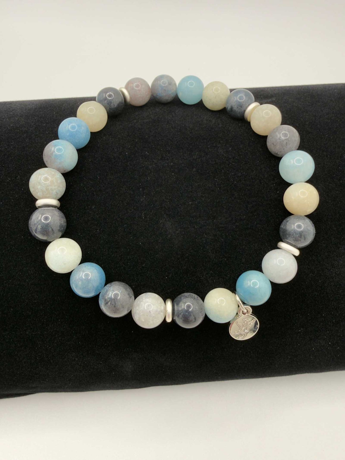Tranquil Awakening Trolleite Bracelet with polished blue beads and elegant accent bead for calming and elegant wear
