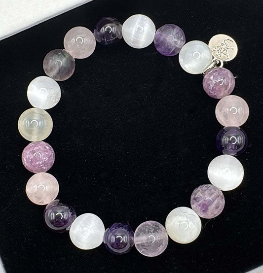Serenity bracelet with Amethyst, Moonstone, Selenite, Fluorite, Rose Quartz, and Lepidolite beads