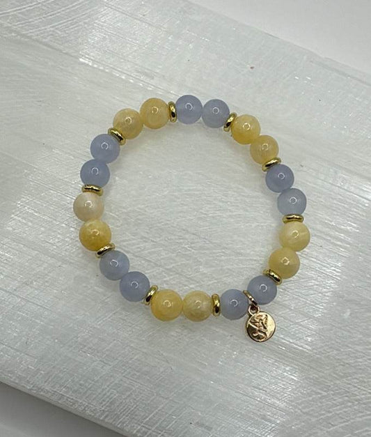 Hope and Optimism Bracelet featuring blue lace agate and yellow calcite beads with gold accents
