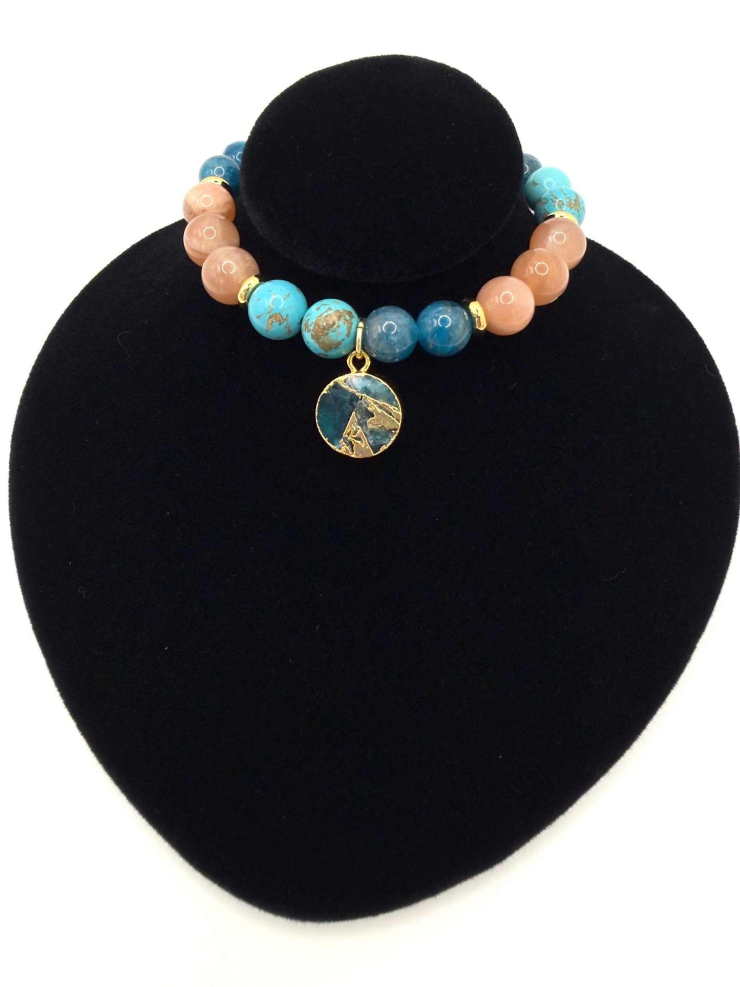 Ocean of Possibilities Bracelet with natural 8mm apatite, sunstone, and turquoise gemstones on stretch cord