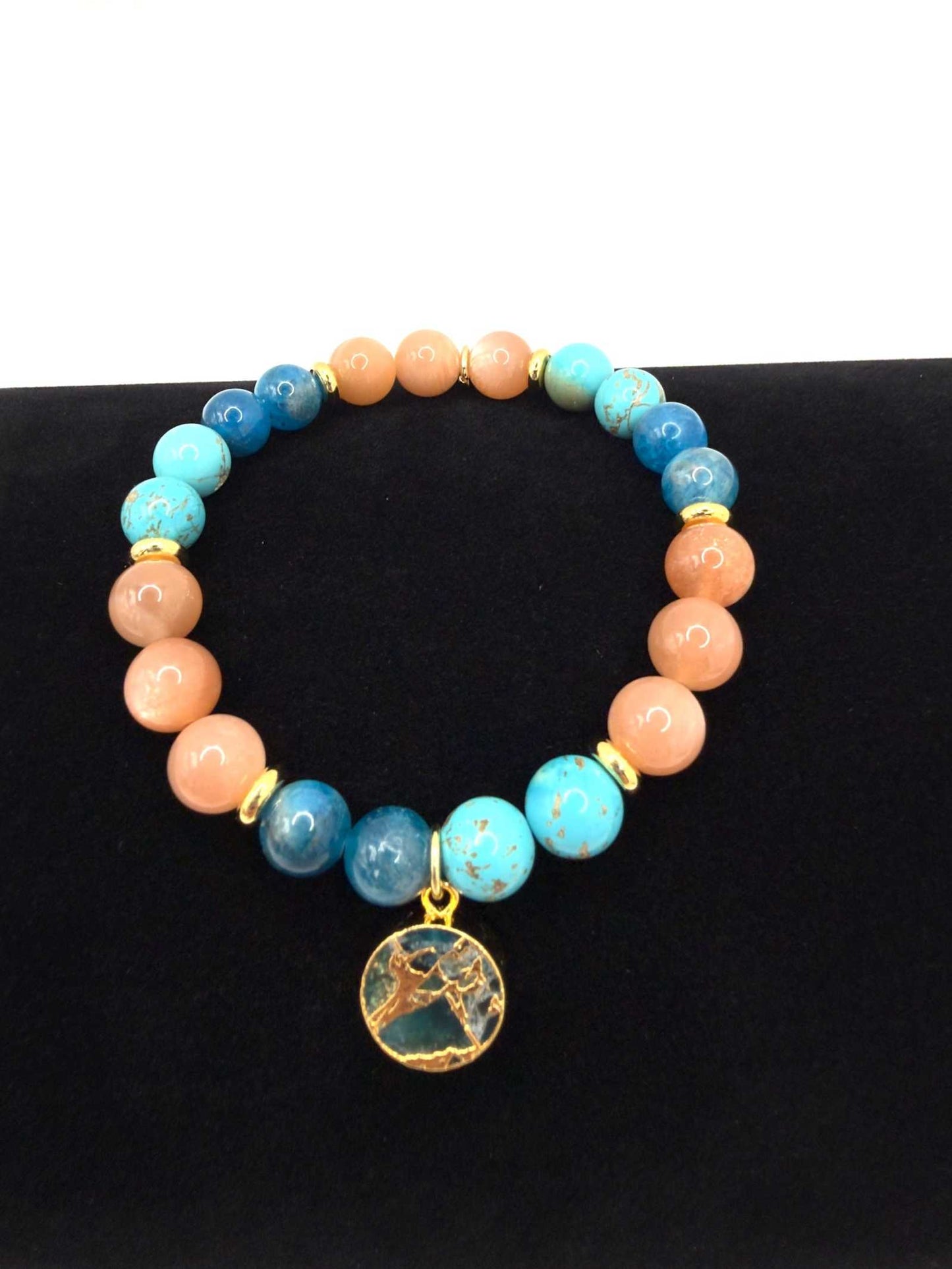 Ocean of Possibilities Bracelet with 8mm apatite, sunstone, and turquoise gemstones on stretch cord