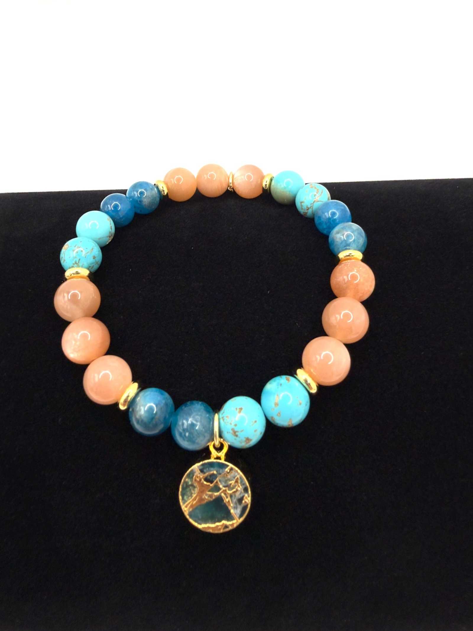 Ocean of Possibilities Bracelet with 8mm apatite, sunstone, and turquoise gemstones on stretch cord