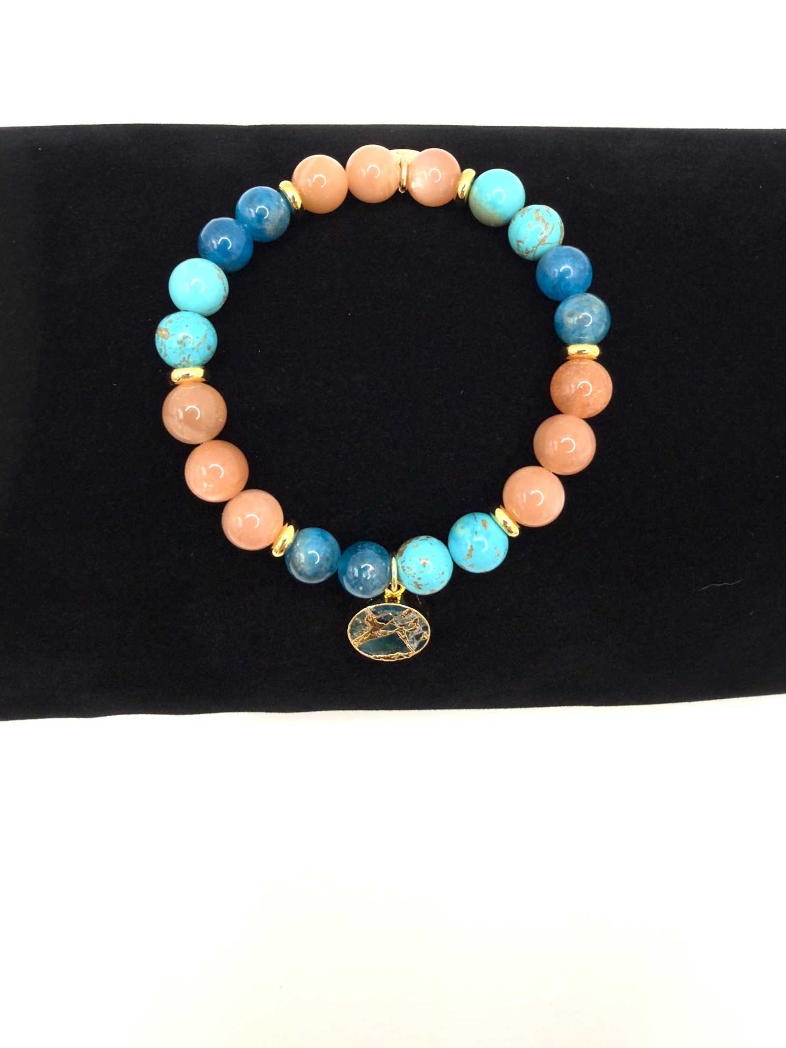 Ocean of Possibilities Bracelet with 8mm apatite, sunstone, and turquoise beads on stretch cord