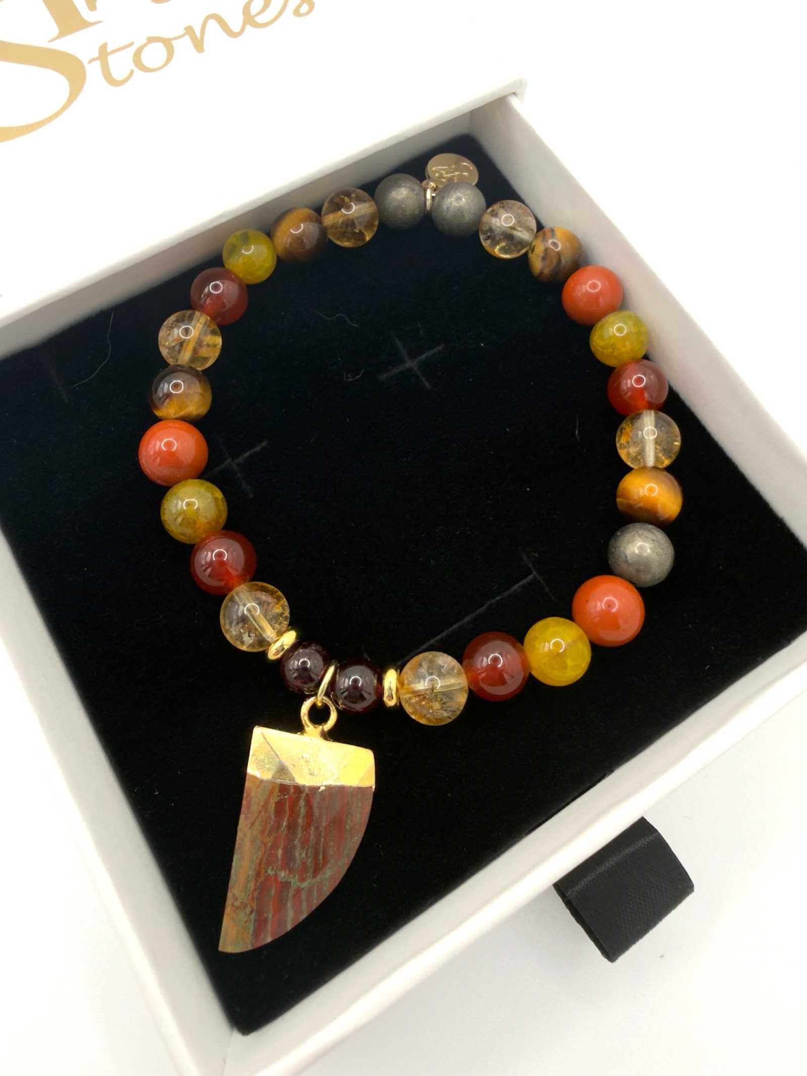 The Warrior Bracelet featuring Citrine, Garnet, Carnelian, Red Jasper, Tiger Eye, Fire Agate, Pyrite, and optional Jasper tusk charm