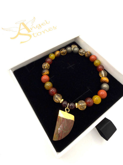 The Warrior Bracelet featuring Citrine, Garnet, Carnelian, Red Jasper, Tiger Eye, Fire Agate, Pyrite, and optional Jasper tusk charm.