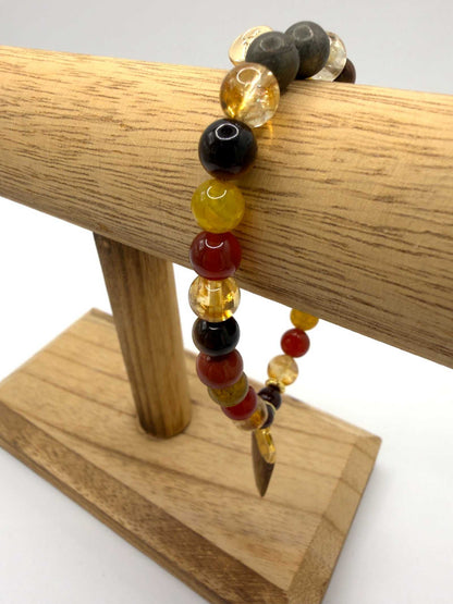 The Warrior Bracelet with Citrine, Garnet, Carnelian, Red Jasper, Tiger Eye, Fire Agate, Pyrite, and optional Jasper tusk charm
