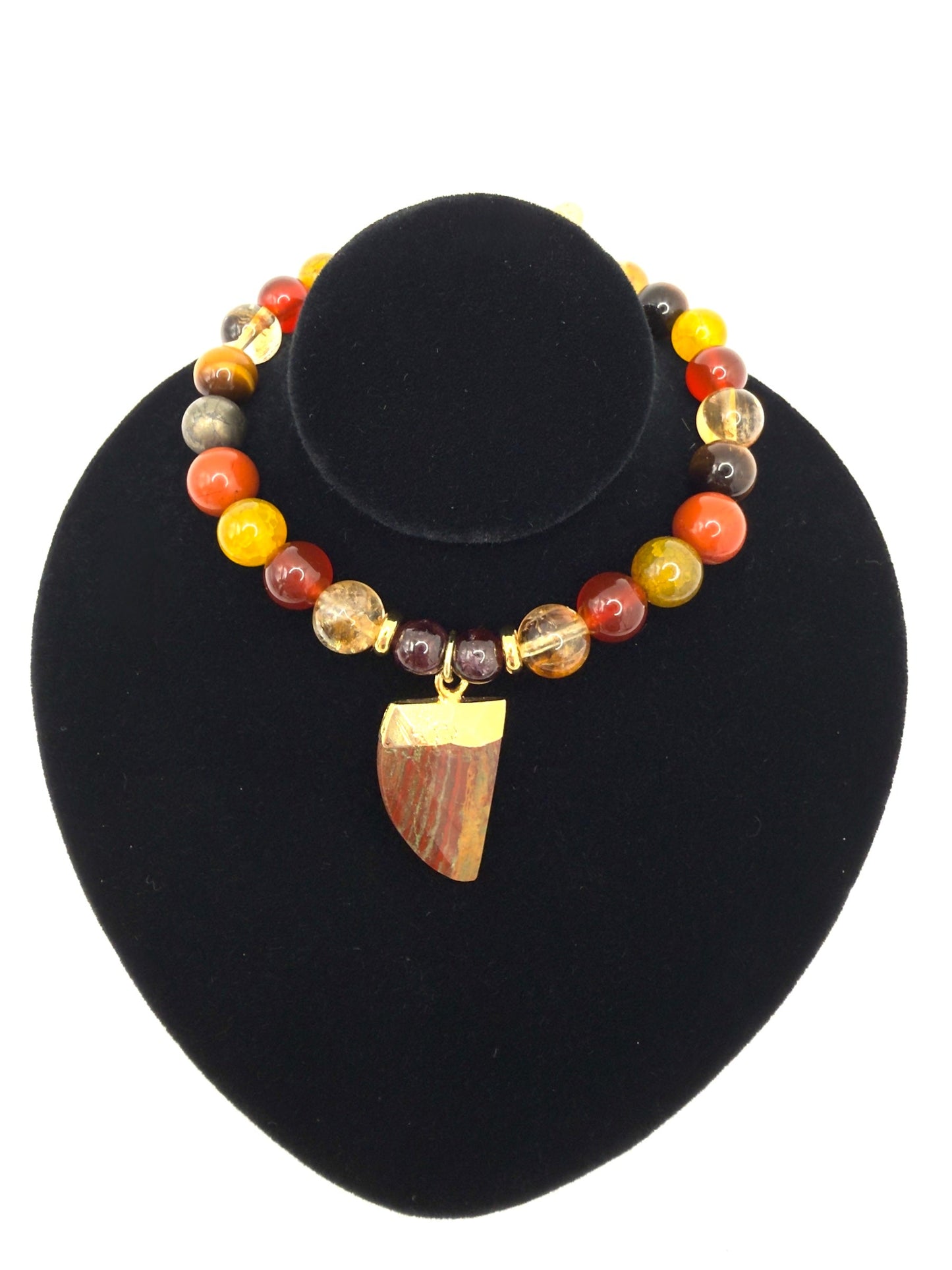 The Warrior Bracelet with Citrine, Garnet, Carnelian, Red Jasper, Tiger Eye, Fire Agate, Pyrite, and optional Jasper tusk charm