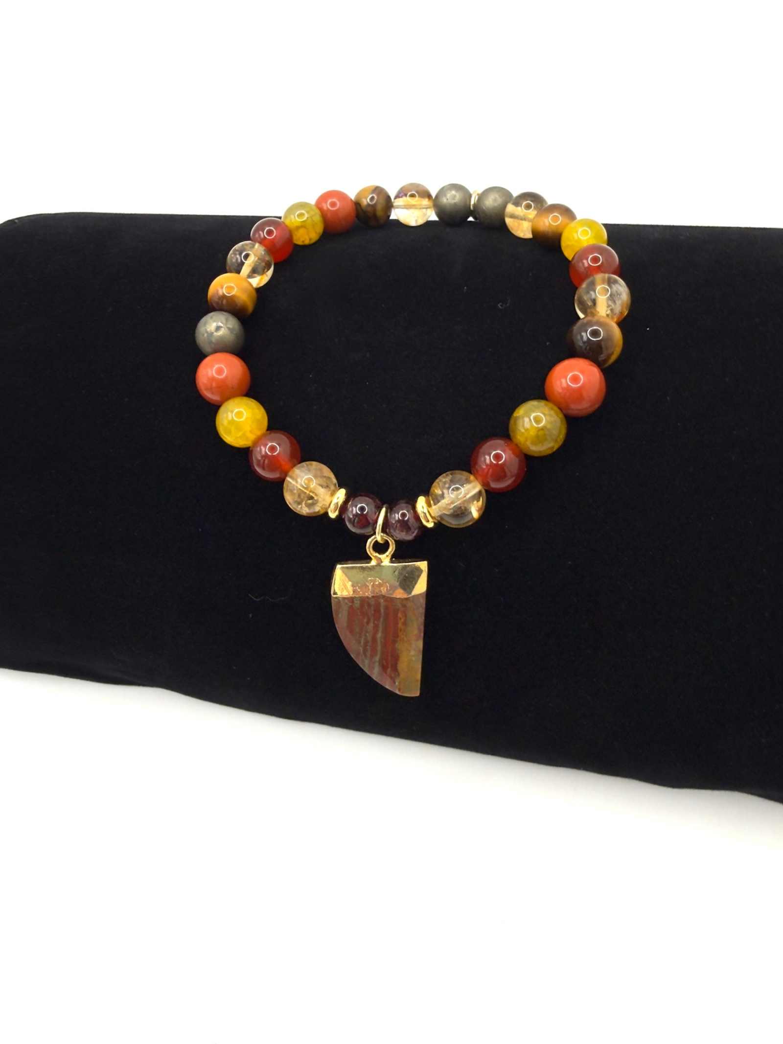 The Warrior Bracelet with Citrine, Garnet, Carnelian, Red Jasper, Tiger Eye, Fire Agate, Pyrite, and optional Jasper tusk charm