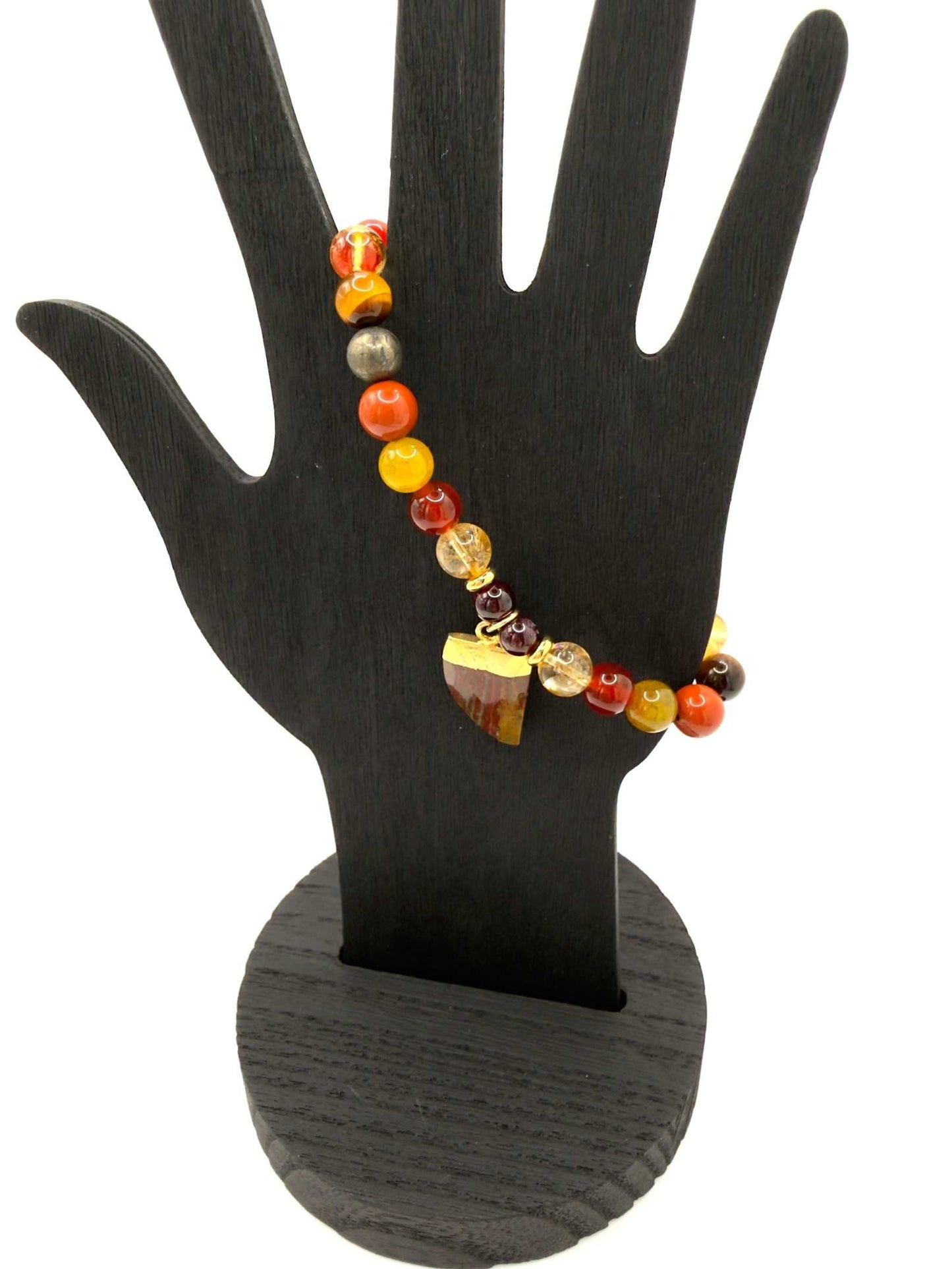 The Warrior Bracelet with Citrine, Garnet, Carnelian, Red Jasper, Tiger Eye, Fire Agate, Pyrite, and optional Jasper tusk charm