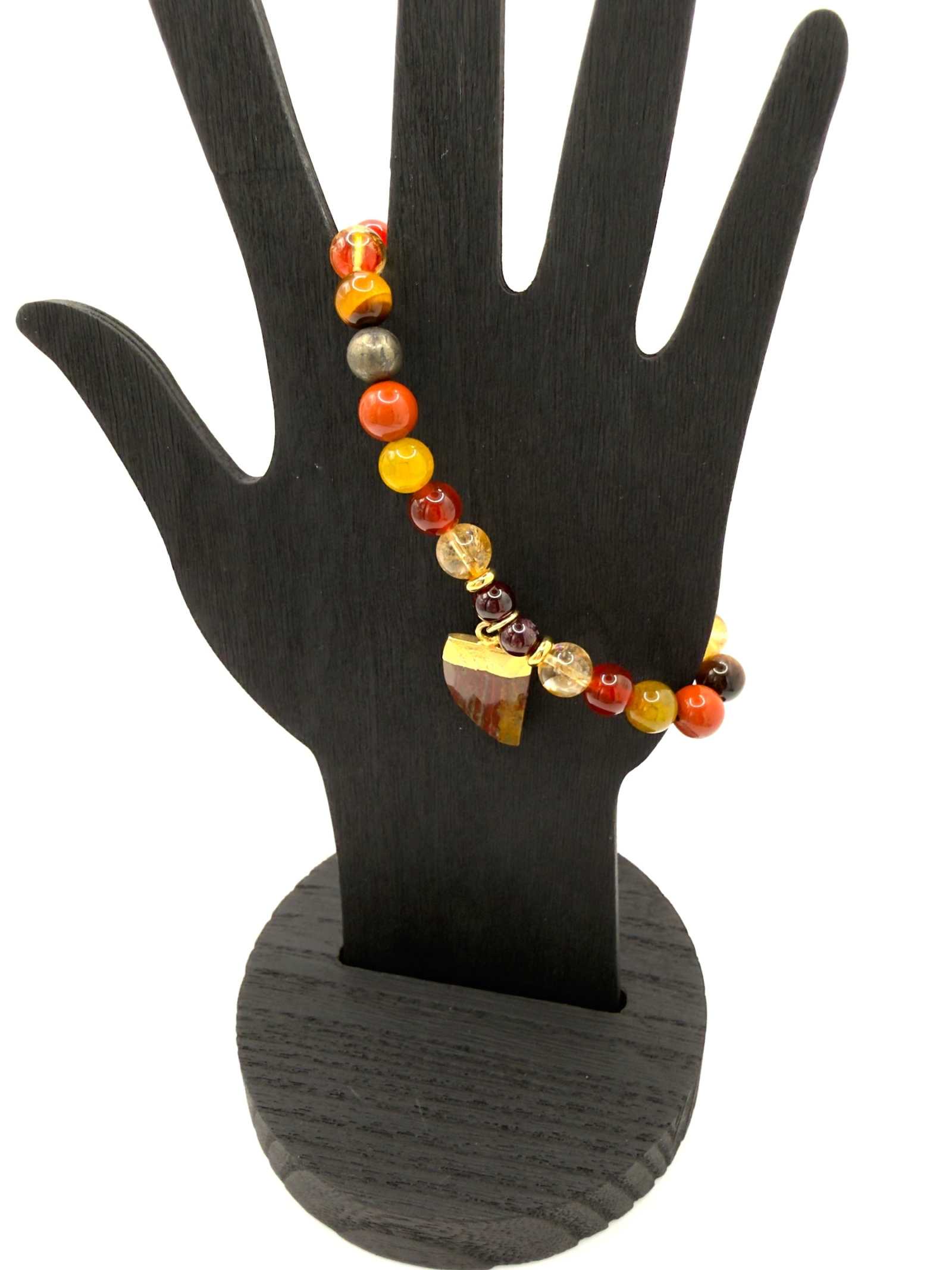 The Warrior Bracelet with Citrine, Garnet, Carnelian, Red Jasper, Tiger Eye, Fire Agate, Pyrite, and optional Jasper tusk charm