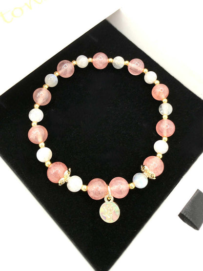 Love Compassion Bracelet featuring Strawberry Quartz and Labradorite with optional gold and pink heart charm