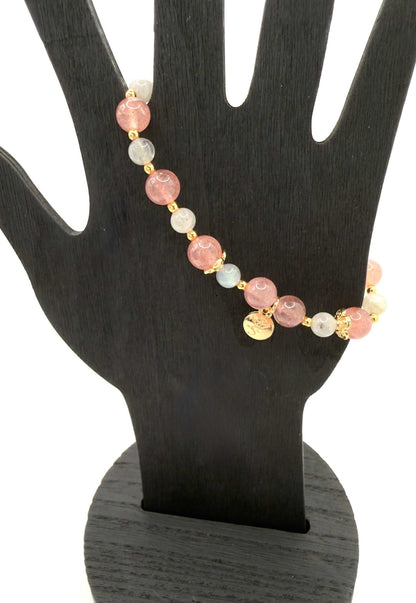 Love Compassion Bracelet featuring Strawberry Quartz and Labradorite beads with optional gold and pink heart charm