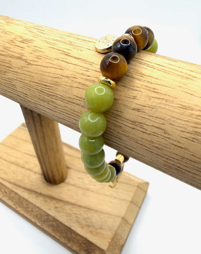 Strength Resilience Bracelet with Serpentine and Tiger Eye stones featuring optional Sun & Moon charm for balance and protection