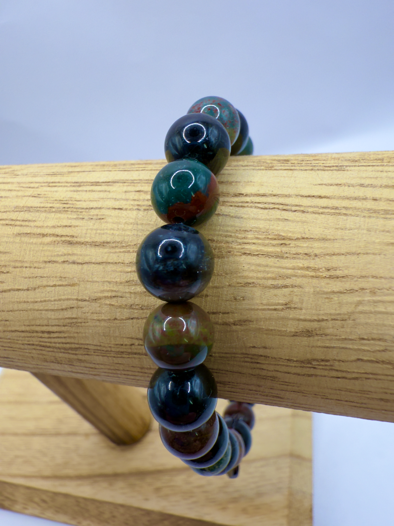 Black Tourmaline and Bloodstone protection bracelet with polished round beads and silver-plated charm
