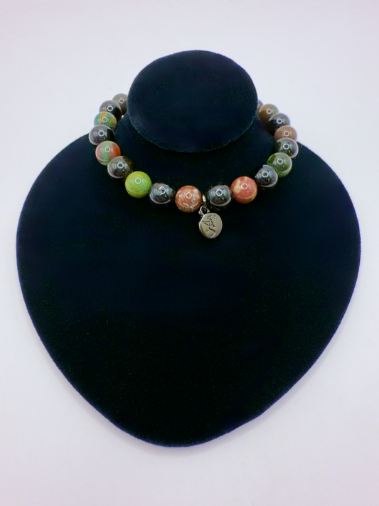 Black Tourmaline and Bloodstone protection bracelet with silver-plated angel charm on black display bust
