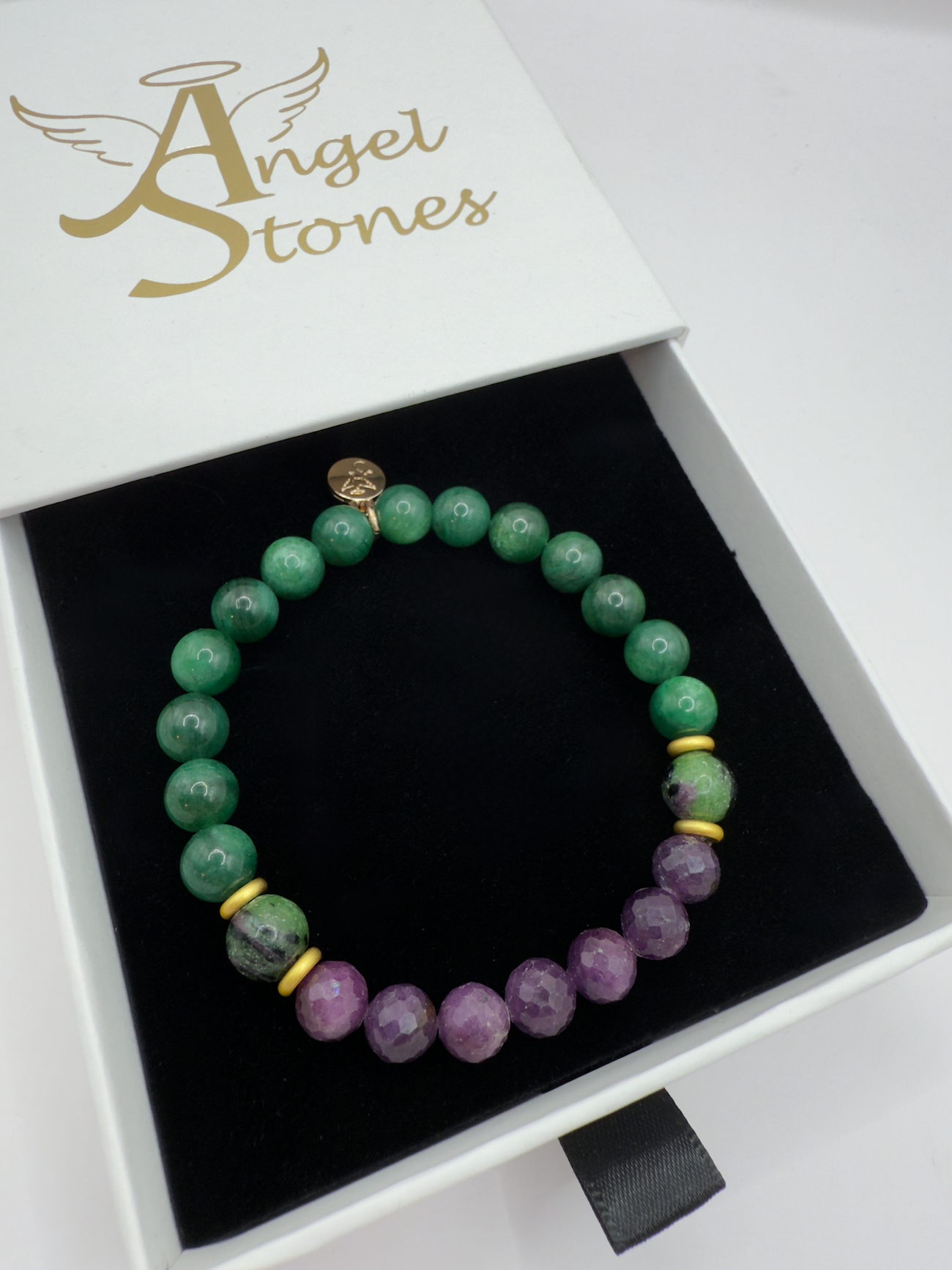 Wicked Bracelets Elphaba edition with emerald, ruby, and zoisite beads in a white Angel Stones box