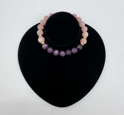 Pink opal and ruby gemstone Wicked Bracelets Glinda edition on black display stand