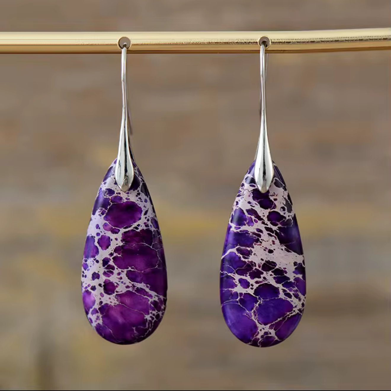 Royal Vein Jasper drop earrings with purple teardrop-shaped stone and silver-tone hooks