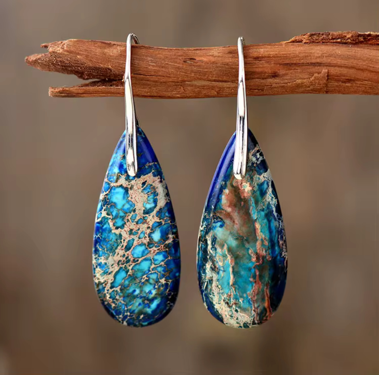 Deep Current Jasper Drop Earrings with elongated teardrop-shaped blue and turquoise jasper stones and silver-tone hangers.