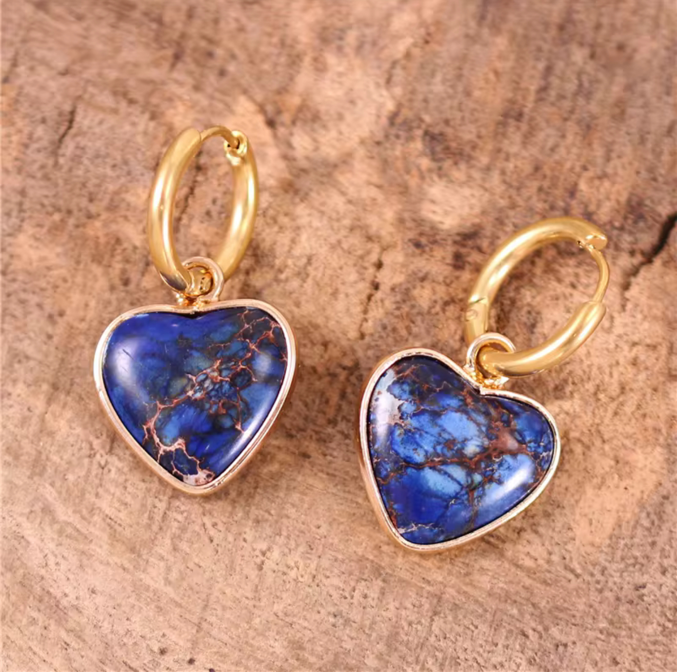 Midnight Tide Jasper huggie earrings with heart-shaped deep blue jasper stones and gold-tone hoops