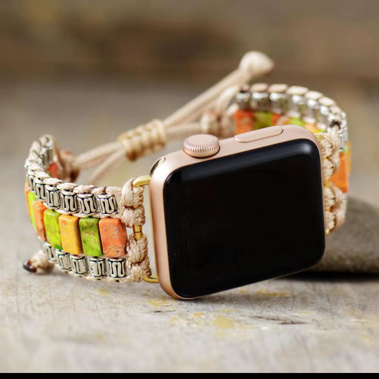 Citrus Calm Apple Watch Band with natural multicolor orange and green stone tiles, neutral woven cord, and silver-tone accents.