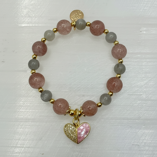 Love Compassion Bracelet with Strawberry Quartz, Labradorite, and heart charm on white background