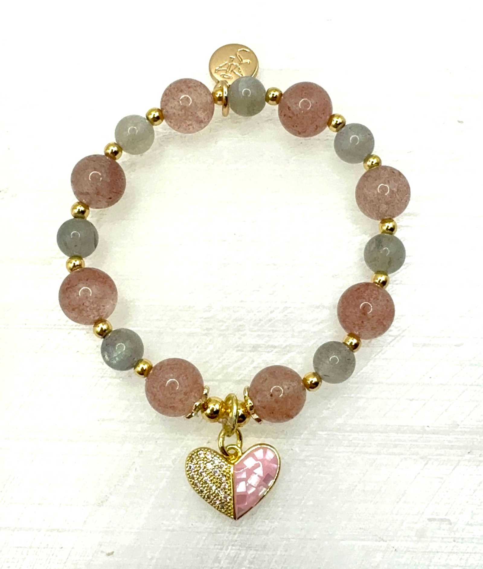Love Compassion Bracelet with Strawberry Quartz, Labradorite, and heart charm on wrist