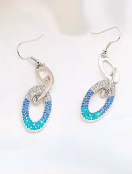 Azure Link Crystal Drop Earrings with interlocking oval links and crystals in white, ocean blue, and turquoise hues on silver-tone hardware