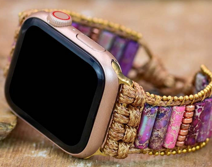 Violet Meadow Apple Watch Band with handwoven cord, purple and pink stone beads, gold-toned accents, and silver floral slide clasp